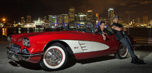 Model and a red 1960 Corvette